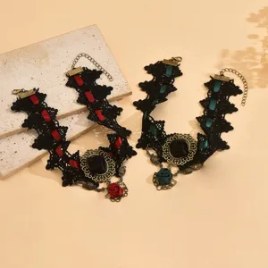 Close-up of gothic vintage lace choker detail with rose pendant and ribbon embellishment.