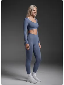 Seamless fitness yoga set long sleeve crop top and leggings for outdoor sports and gym workout.