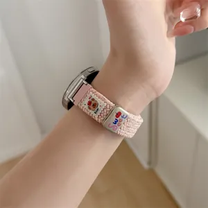 Pink braided watch strap replacement with cute bear design and metal buckle for smartwatch.