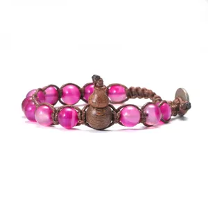 Bracelet en perles d'agate rose naturelle avec pendentif gourde en bois cordon tissé détail