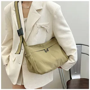 Detail view of the casual nylon crossbody bag with spacious capacity, adjustable strap.