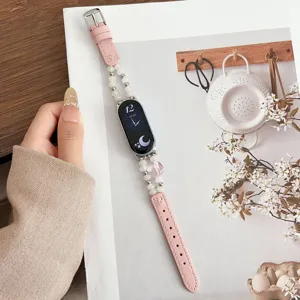 Cinturino per orologio in pelle con perle di cristallo compatibile con fitness tracker.