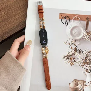 Cinturino orologio pelle perle cristallo vista dettaglio, accessorio ricambio.