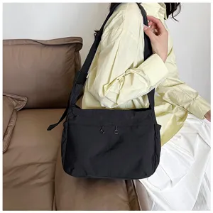 Casual black nylon crossbody bag, large capacity daily commuter shoulder bag for women.