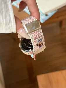 Bracelet de montre en nylon tissé compatible avec montre connectée, souple et respirant avec charm chiot.
