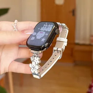 Metal flower leather watch band compatible with Apple Watch, stylish floral strap replacement.