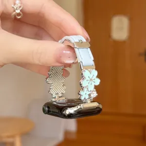 Replacement metal flower leather strap for Apple Watch, stylish floral charm design for women.