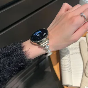 Bracelet de montre perle étoile compatible avec Apple Watch, accessoire en métal élégant.