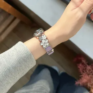 Metal flower leather watch strap detail view, compatible with apple smart watch accessories.
