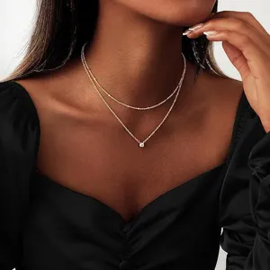 Collana doppia in oro con ciondolo solitario e catena di perle gioiello minimalista