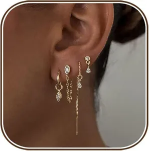 Stunning 14k gold plated cubic zirconia ear stack set, delicate multi piece pierced earrings.