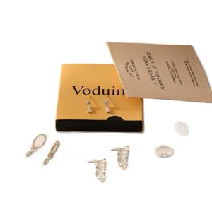 Chic multi-piece earring set featuring 14k gold plated brass and sparkling zircon stones.