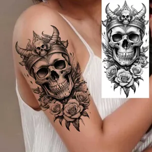 Waterproof skull temporary tattoo sticker for arm and leg, realistic black Gothic body art.