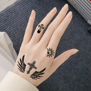 Temporary tattoo stickers featuring wings, cross, and tribal designs for hand and body art.