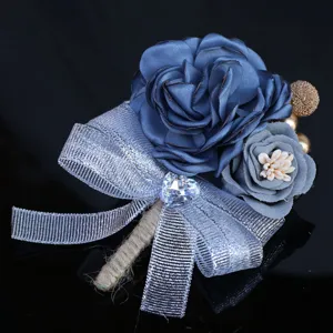 Detail view of the elegant Korean style wedding bridal corsage with blue rose and silver bow.