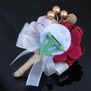 Wedding boutonniere back detail showing pin clasp and floral arrangement craftsmanship