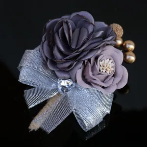 Elegant Korean style wedding corsage with fabric rose, silver ribbon and crystal heart.