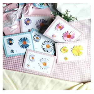 Lot de patchs brodés marguerites, application en tissu pour réparation vêtements et DIY.