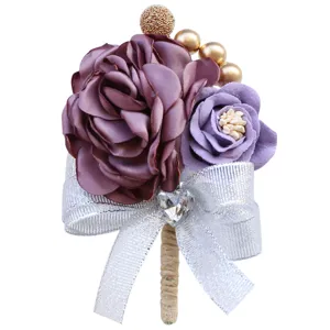 Elegant purple fabric rose corsage with silver bow and crystal for wedding suit accessory.