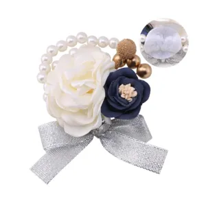 Korean style wedding corsage with artificial roses, pearls, and silver bowknot.