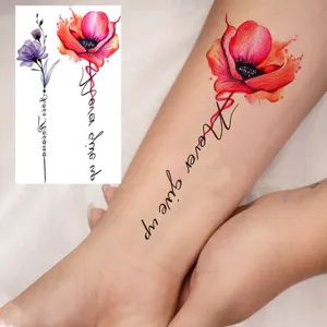 Autocollant de tatouage temporaire floral imperméable avec design de citation inspirante.