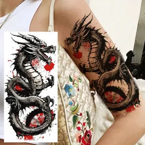 Waterproof dragon temporary tattoo sticker for arm, realistic black and red ink design.