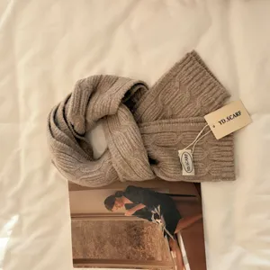 Cozy winter cable-knit wool blend scarf in solid khaki color, soft and warm for daily wear.