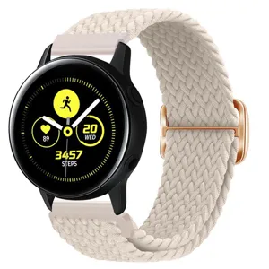 Close-up van elastische geweven nylon horlogeband met roségouden gesp en display.