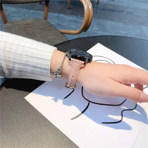 Pink leather watch strap for smart watch, elegant wristwear accessory with silver bracelet.