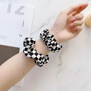 Karo Stoffarmband für Apple Watch, stilvolles kariertes Design Zubehör Detailansicht.