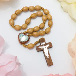 Wooden rosary bracelet with cross and heart pendant, vintage catholic prayer beads for daily wear.