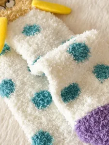 Thick coral fleece fuzzy socks with blue dots and cute 3D cartoon detail for winter cozy home wear.
