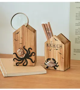 Mediterranean style wooden house pen holder with cute ocean crab and octopus design.