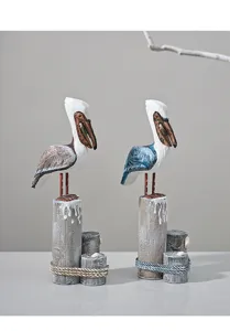 Handcrafted wooden pelican bird figurine, Mediterranean coastal home decor ornament.