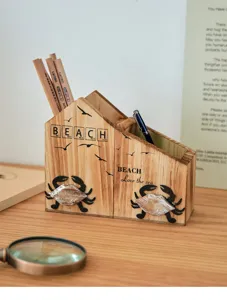 Mediterranean style wooden pencil holder with cute crab decor for desktop storage and office decor.