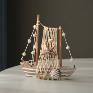 Vintage wooden sailboat model ornament with fishing net and shells, rustic home decor gift.
