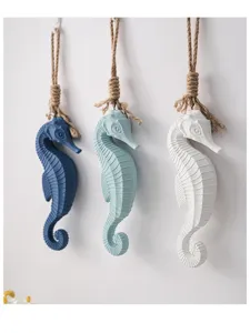 Detailed view of Mediterranean style resin seahorse wall hanging ornaments with hemp ropes.