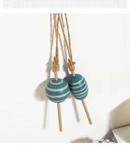 Mediterranean style solid wood fishing float hanging ornament for wall decor detailing.