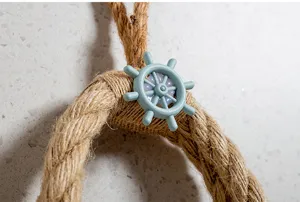 Mediterranean handmade jute rope toilet paper holder detail shot, durable and stylish.