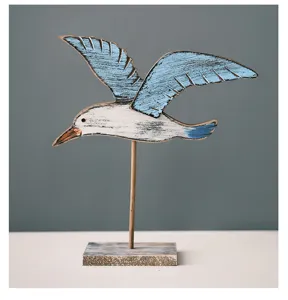 Retro Mediterranean style wooden seagull bird figurine home table desk decor detail view.