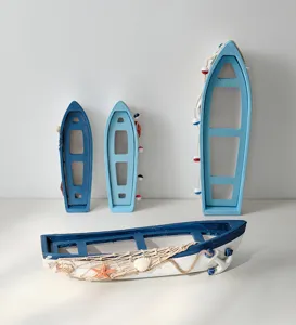 Mediterranean wooden boat decor detail, ocean style craft ornament with net and shells.