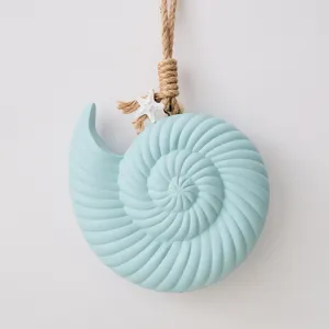 Mediterranean nautical seashell hanging decoration, blue shell wall art for home bar and cafe.