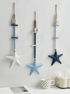 Mediterranean wooden starfish wall hanging decor, blue and white bead garland art for home.
