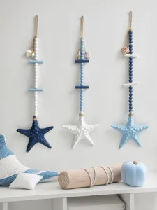 Mediterranean style wooden starfish wall hanging detail showcasing nautical beads and coastal decor.