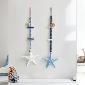 Mediterranean style wooden starfish wall hanging decoration with blue beads and natural shells.