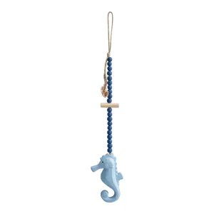 Wooden seahorse hanging ornament with blue beads, ocean style home decor pendant.