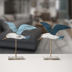 Vintage wooden seagull figurine coastal bird tabletop decor for home living room shelf ornament.