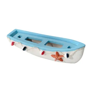 Chic Mediterranean style wooden boat ornament with starfish decor, perfect for home tabletop display.