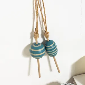 Mediterranean wooden fish float wall hanging, blue striped nautical decor for home and room.