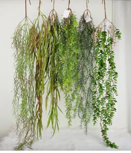 Artificial hanging plants vine green leaf wall decor for home room interior decoration.